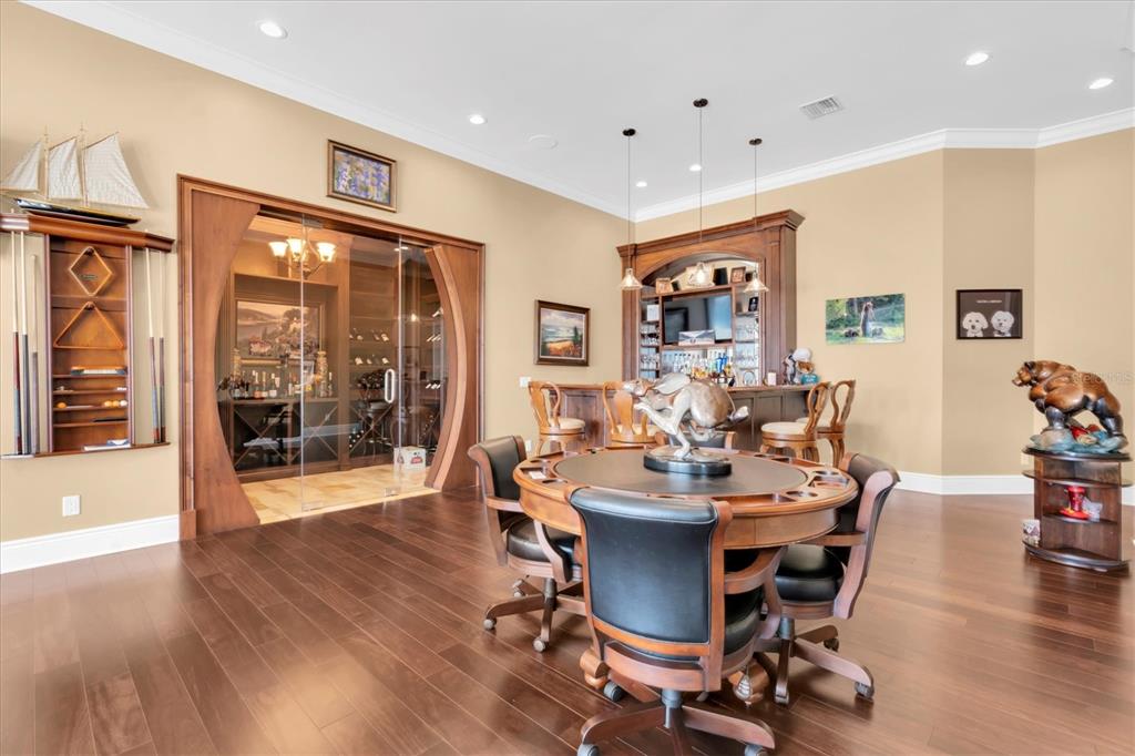 4650 Ridgeview Road Palm Harbor, FL 34684 - Photo 26 of 100 a view of a dining room with furniture window and wooden floor