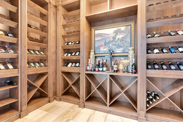 a view of a workspace with furniture and a flat screen tv