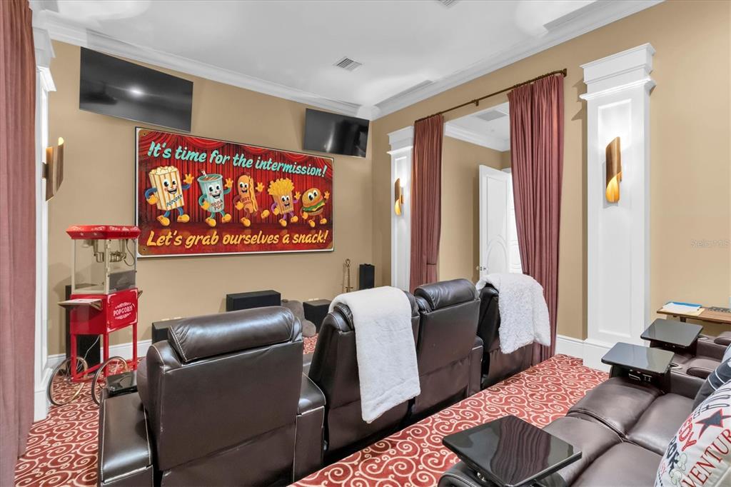 4650 Ridgeview Road Palm Harbor, FL 34684 - Photo 33 of 100 a living room with furniture and a flat screen tv