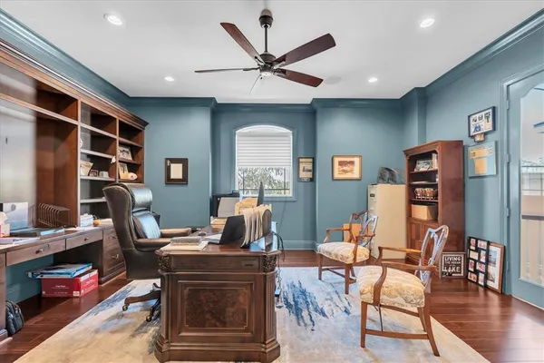 a kitchen with cabinets a sink and wooden floor