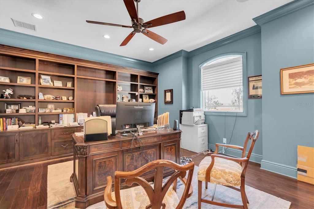 4650 Ridgeview Road Palm Harbor, FL 34684 - Photo 38 of 100 a work room with furniture a rug and a window