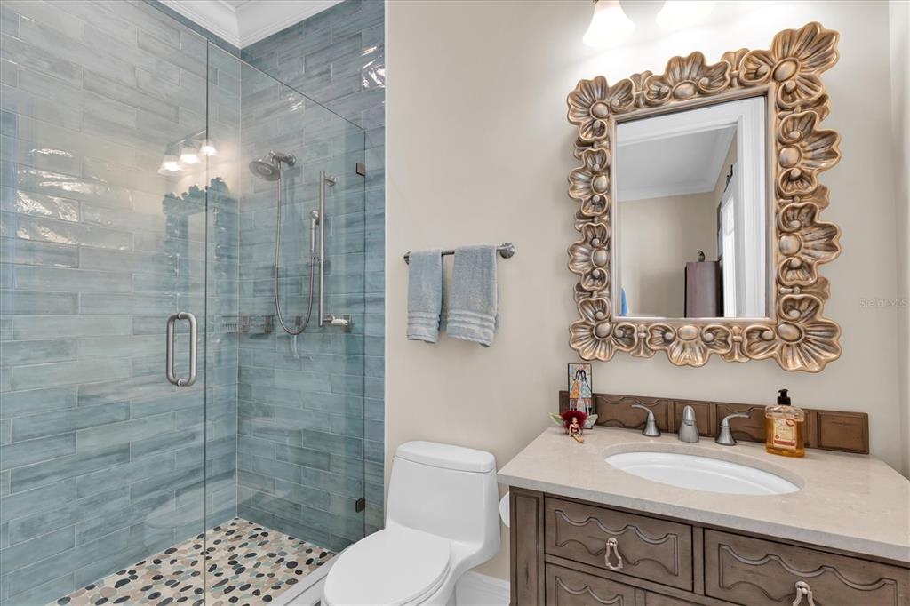 4650 Ridgeview Road Palm Harbor, FL 34684 - Photo 58 of 100 a bathroom with a sink a toilet and shower