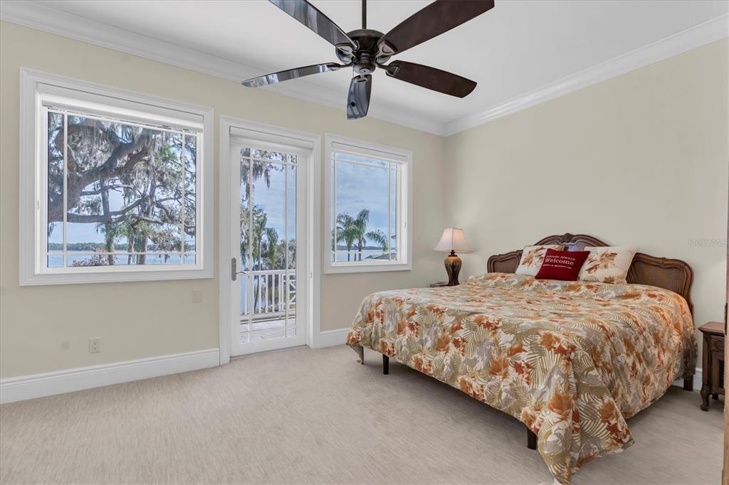 4650 Ridgeview Road Palm Harbor, FL 34684 - Photo 62 of 100 a bedroom with a bed dresser and a window