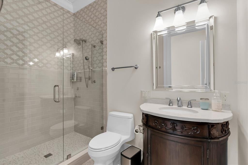 4650 Ridgeview Road Palm Harbor, FL 34684 - Photo 66 of 100 a bathroom with a sink toilet and shower