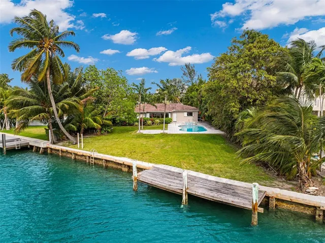 a view of a swimming pool with a garden