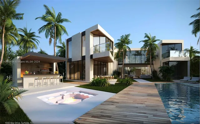 a patio with a table and chairs under an umbrella