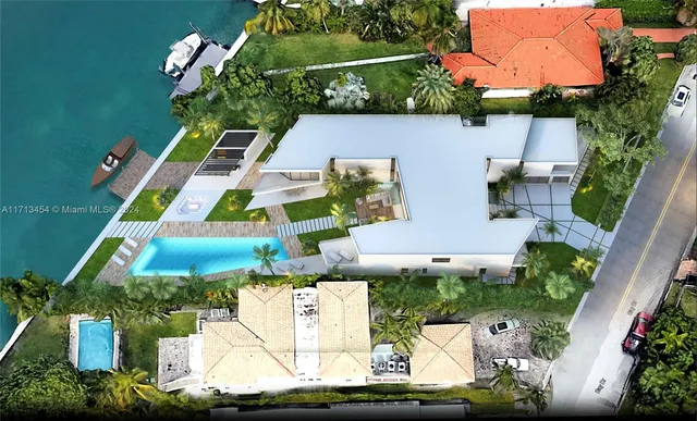 an aerial view of house with yard swimming pool and outdoor seating