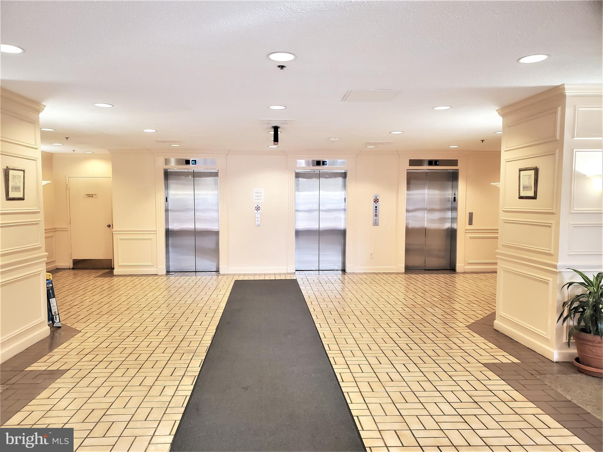 15100 Interlachen Drive, Unit 4516 Silver Spring, MD 20906 - Photo 25 of 28 Lobby Entrance with Three Elevator Choices