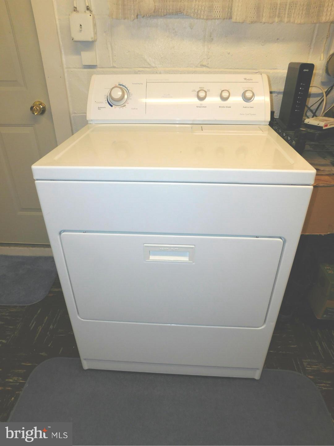 7708 Charlesmont Road Baltimore, MD 21222 - Photo 26 of 28 a view of washer and dryer