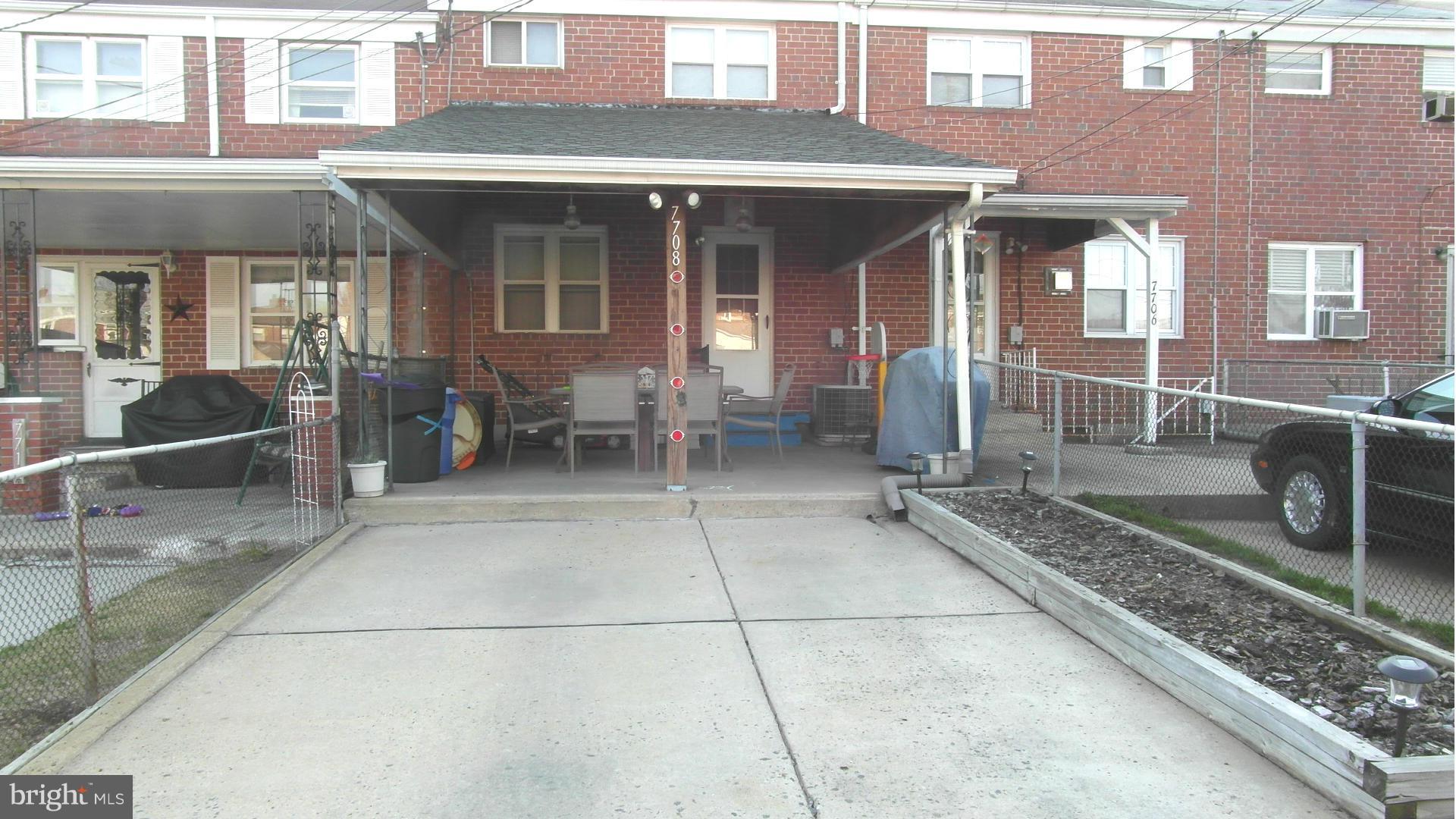 7708 Charlesmont Road Baltimore, MD 21222 - Photo 27 of 28 a view of a building with sitting area