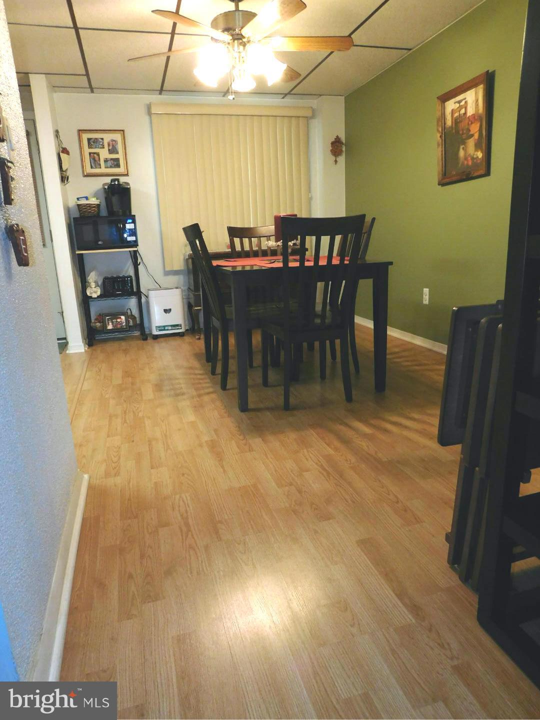 7708 Charlesmont Road Baltimore, MD 21222 - Photo 6 of 28 a view of a dining room with furniture