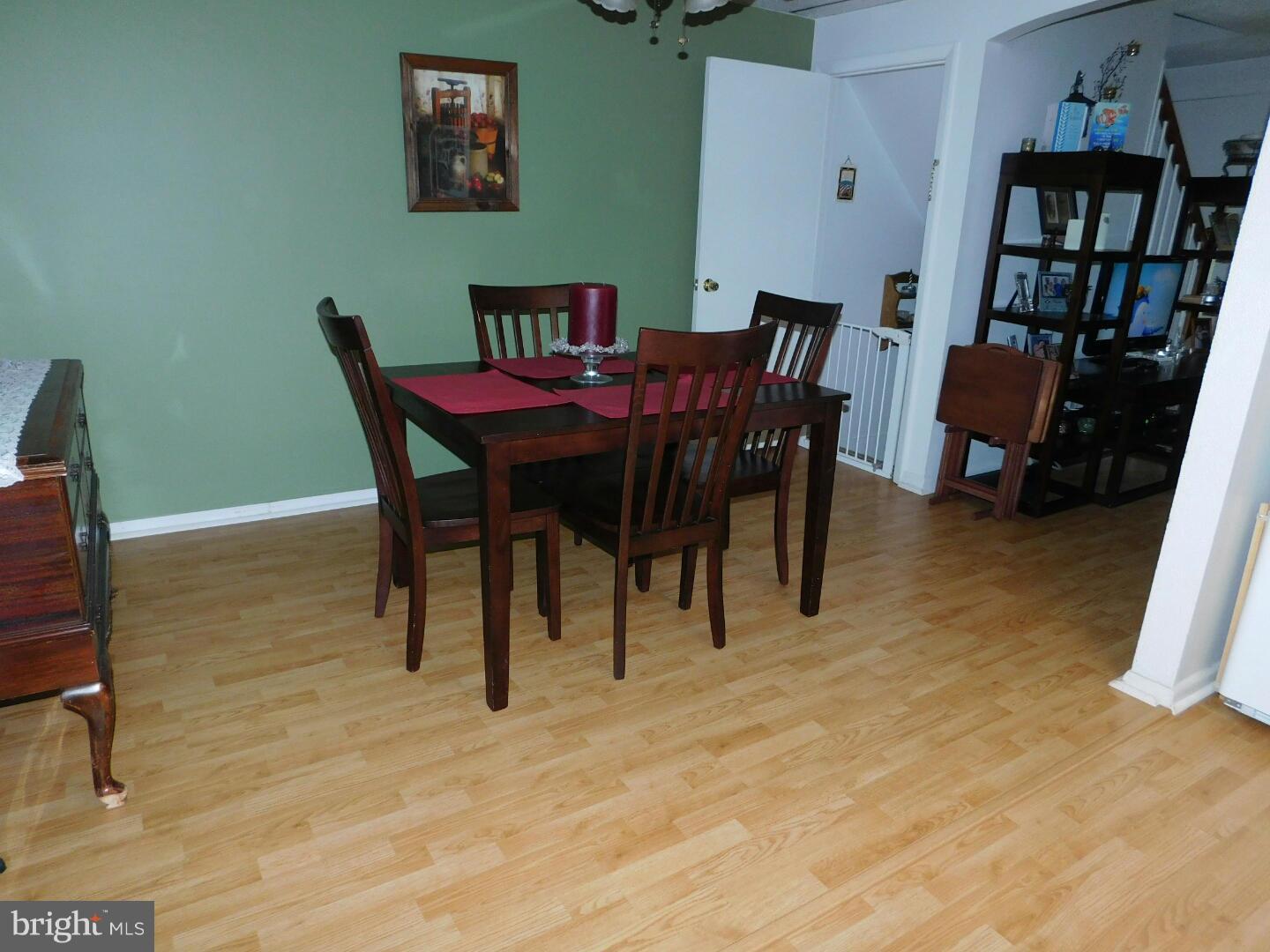 7708 Charlesmont Road Baltimore, MD 21222 - Photo 7 of 28 a view of a dining room with furniture