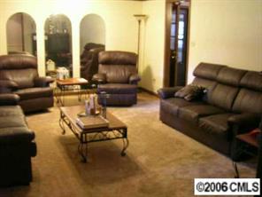 307 Florence Road Statesville, NC 28625 - Photo 3 of 7 a living room with furniture and a couch