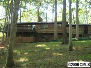 307 Florence Road Statesville, NC 28625 - Photo 5 of 7 a backyard of a house with lots of green space