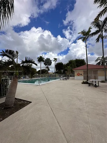 a view of a city street with a slide
