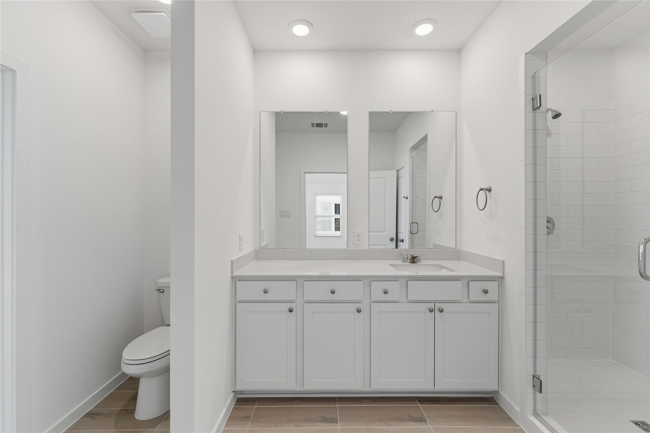 2206 Via Isa Lane Houston, TX 77051 - Photo 18 of 30 a bathroom with a granite countertop sink a toilet and a mirror