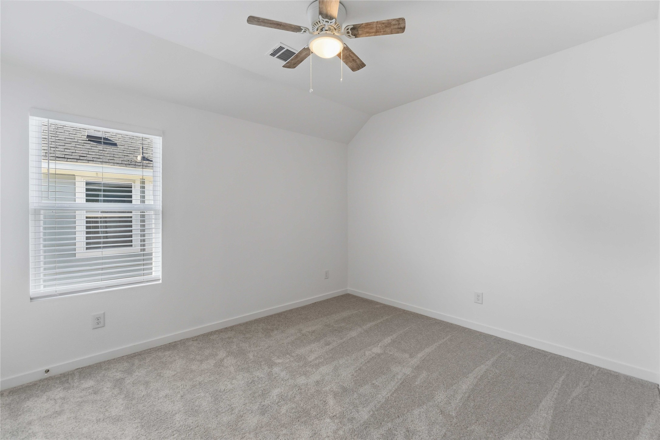 2206 Via Isa Lane Houston, TX 77051 - Photo 20 of 30 an empty room with windows and fan