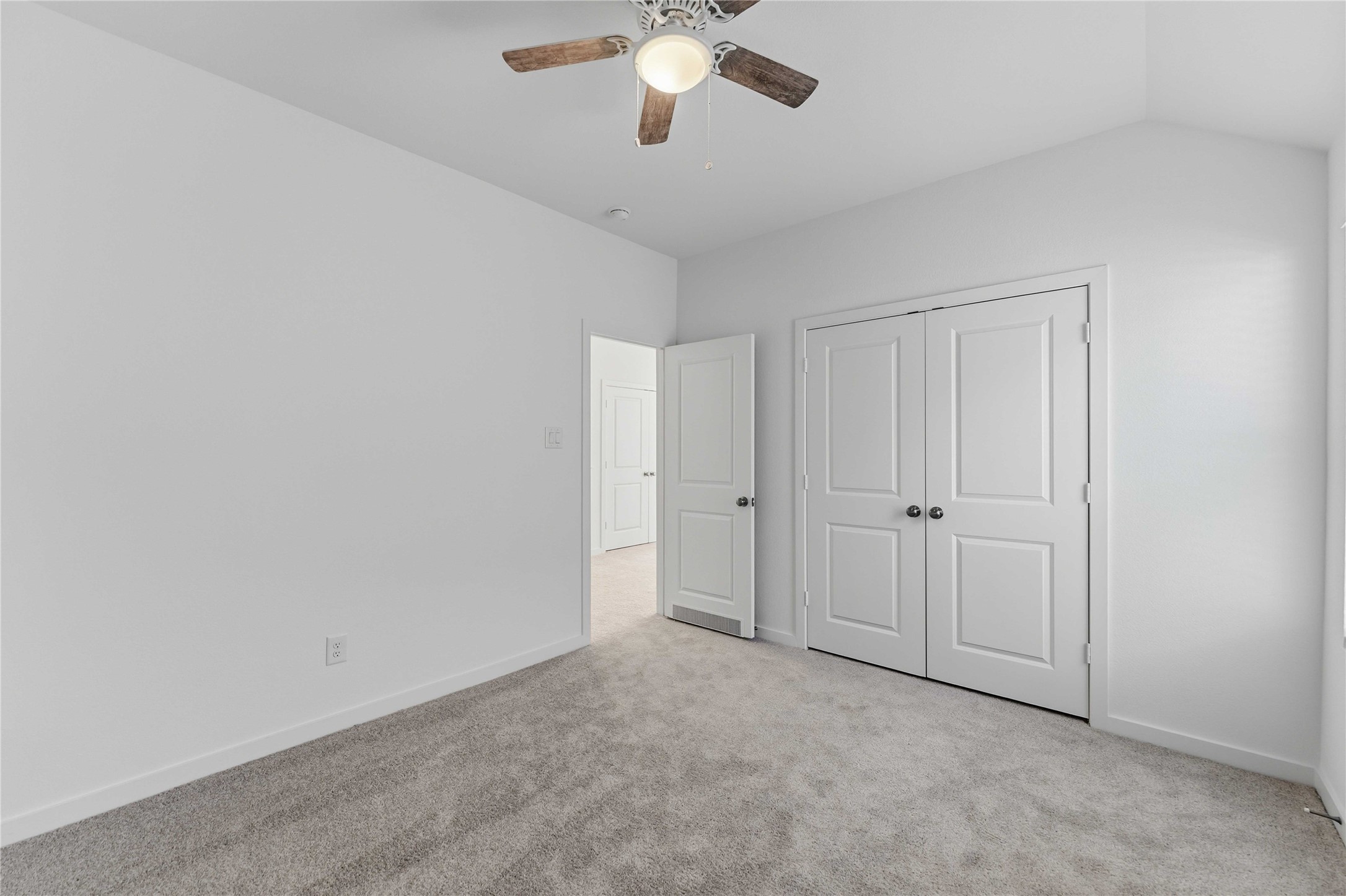 2206 Via Isa Lane Houston, TX 77051 - Photo 21 of 30 a view of an empty room and chandelier fan