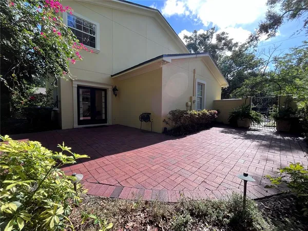 a view of a back yard of the house