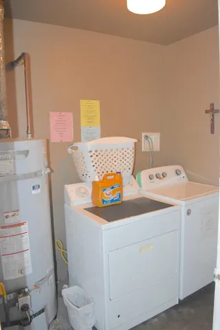 a utility room with dryer and washer