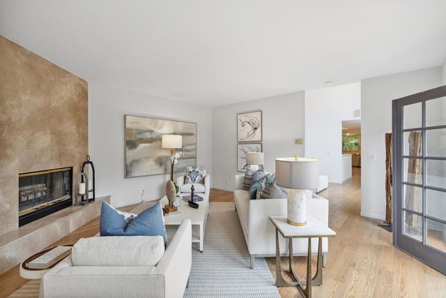 a large kitchen with stainless steel appliances lots of counter top space