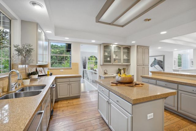 a view of a balcony with wooden floor and door