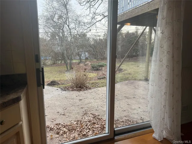 a backyard of a house with lots of green space