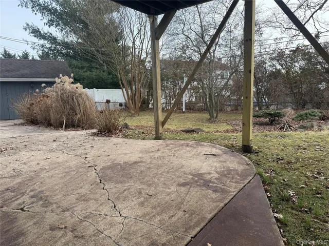 a view of a yard with an outdoor space
