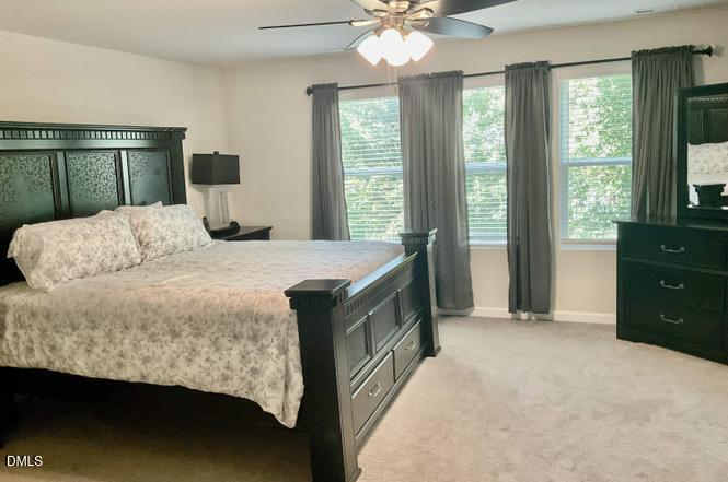 1807 Wrenn Road Durham, NC 27703 - Photo 39 of 43 a bedroom with a bed and window