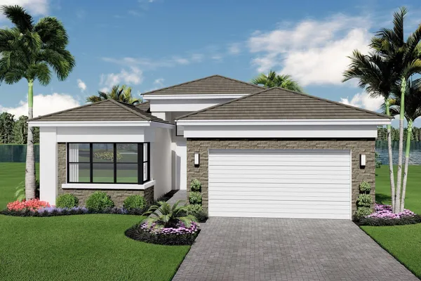 a front view of a house with a garden and plants