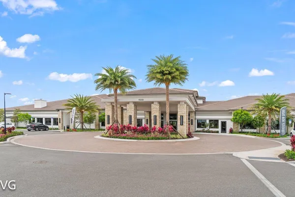 a front view of a building with small garden