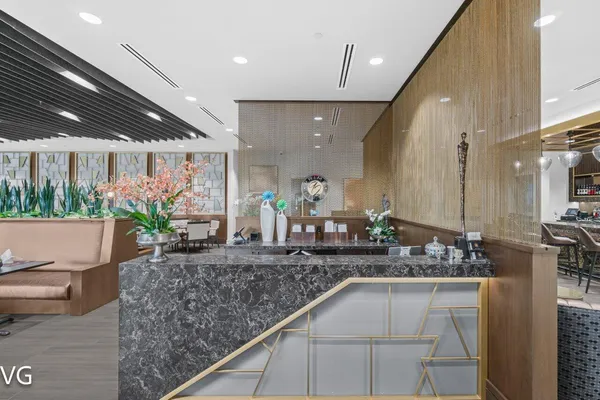 a kitchen with counter top space and stainless steel appliances