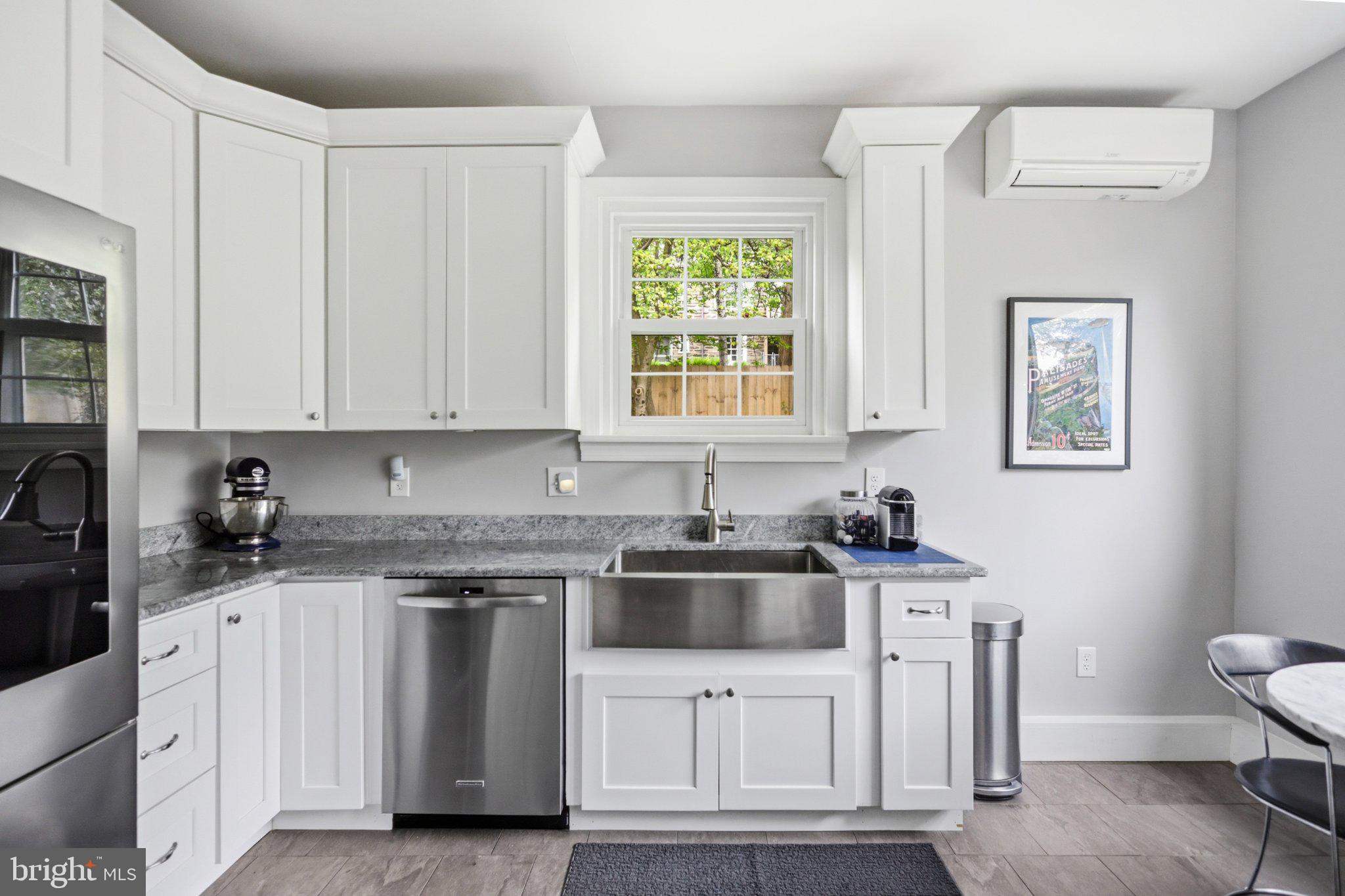 91 East Bells Mill Road Philadelphia, PA 19118 - Photo 13 of 29 Modern kitchen with sleek finishes.