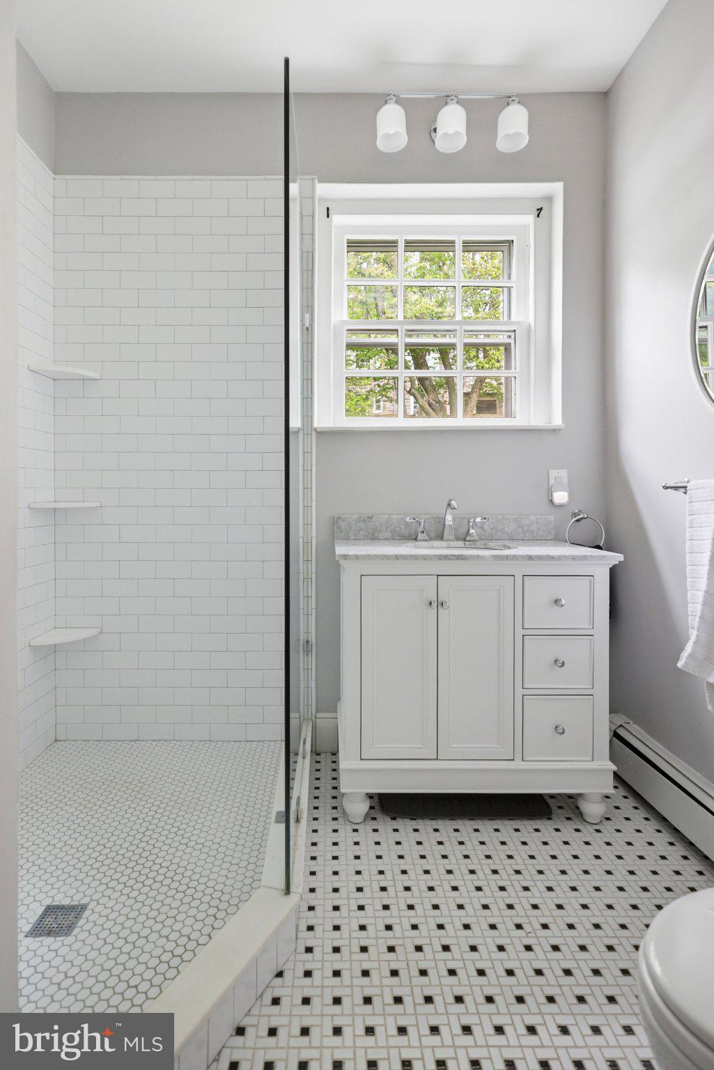 91 East Bells Mill Road Philadelphia, PA 19118 - Photo 19 of 29 First floor en suite with walk in shower