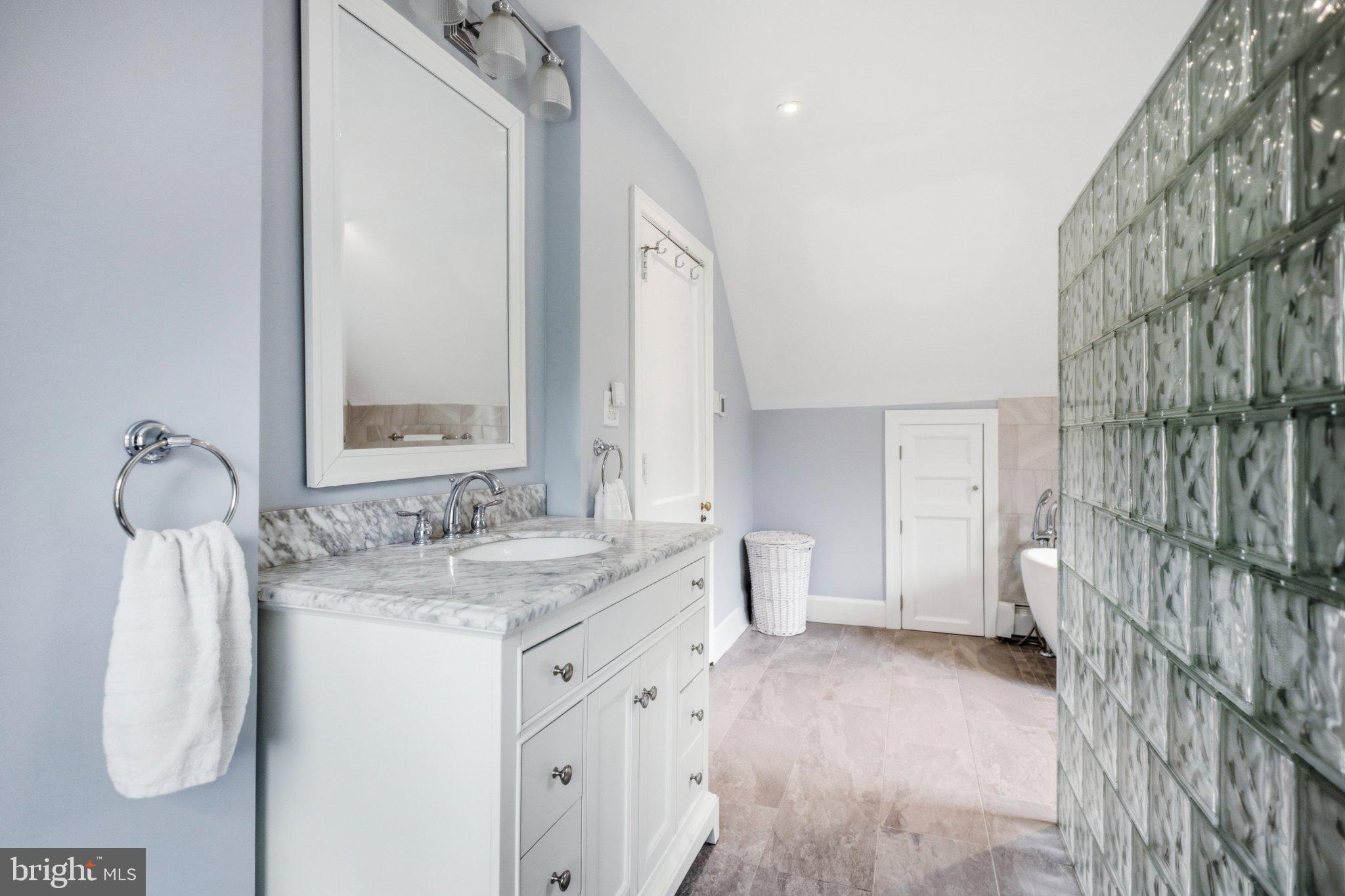 91 East Bells Mill Road Philadelphia, PA 19118 - Photo 25 of 29 Serene bathroom with modern elegance.
