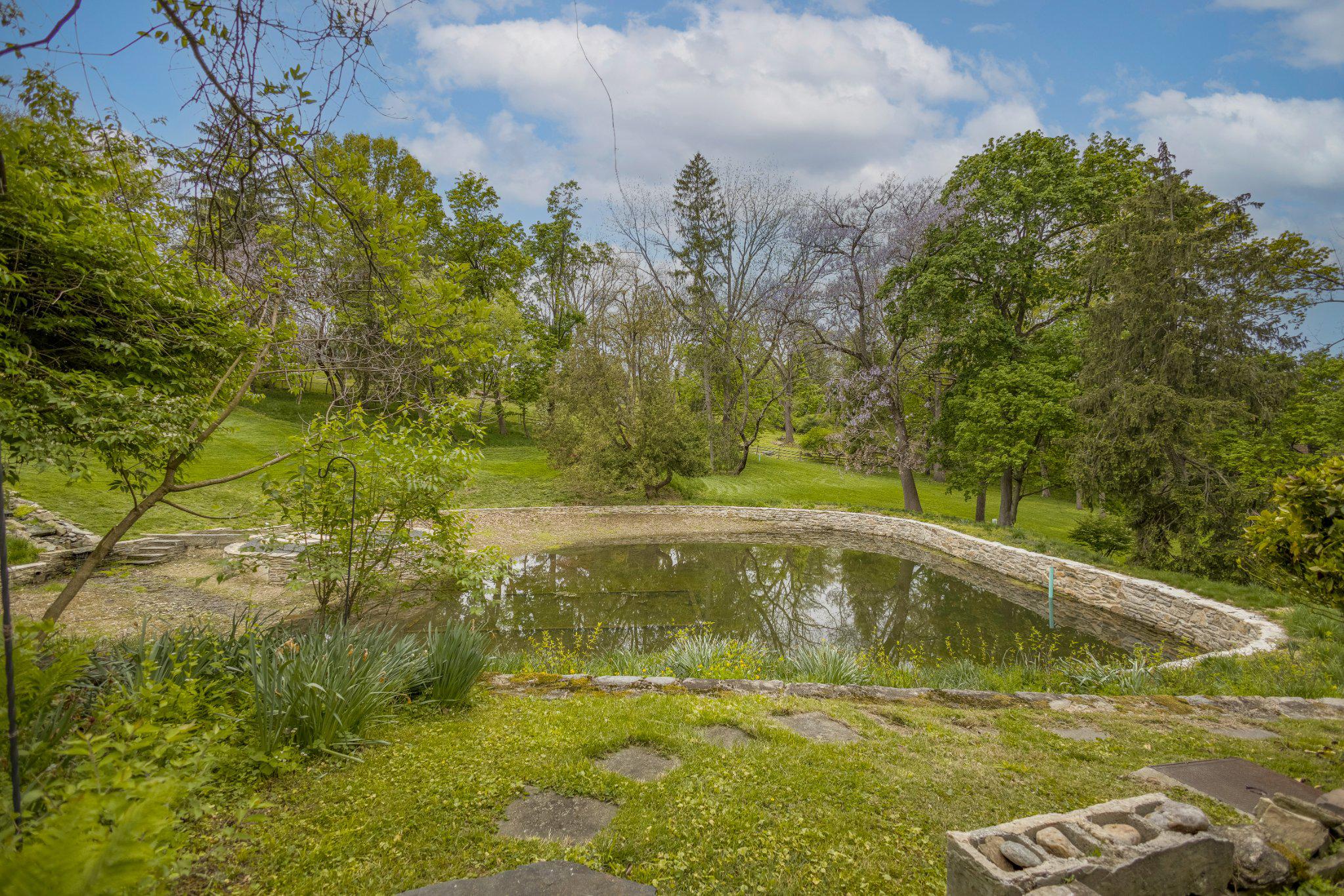 91 East Bells Mill Road Philadelphia, PA 19118 - Photo 9 of 29 View of (neighbor's) pond from the study