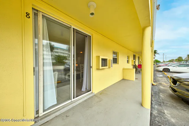 a view of a porch with furniture