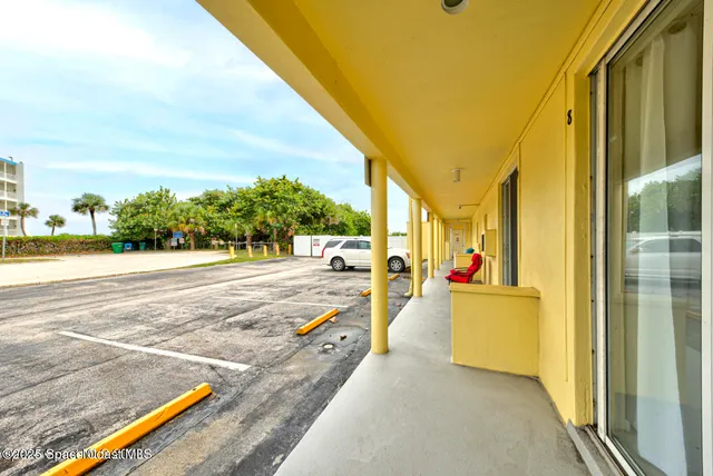 a view of swimming pool with a patio