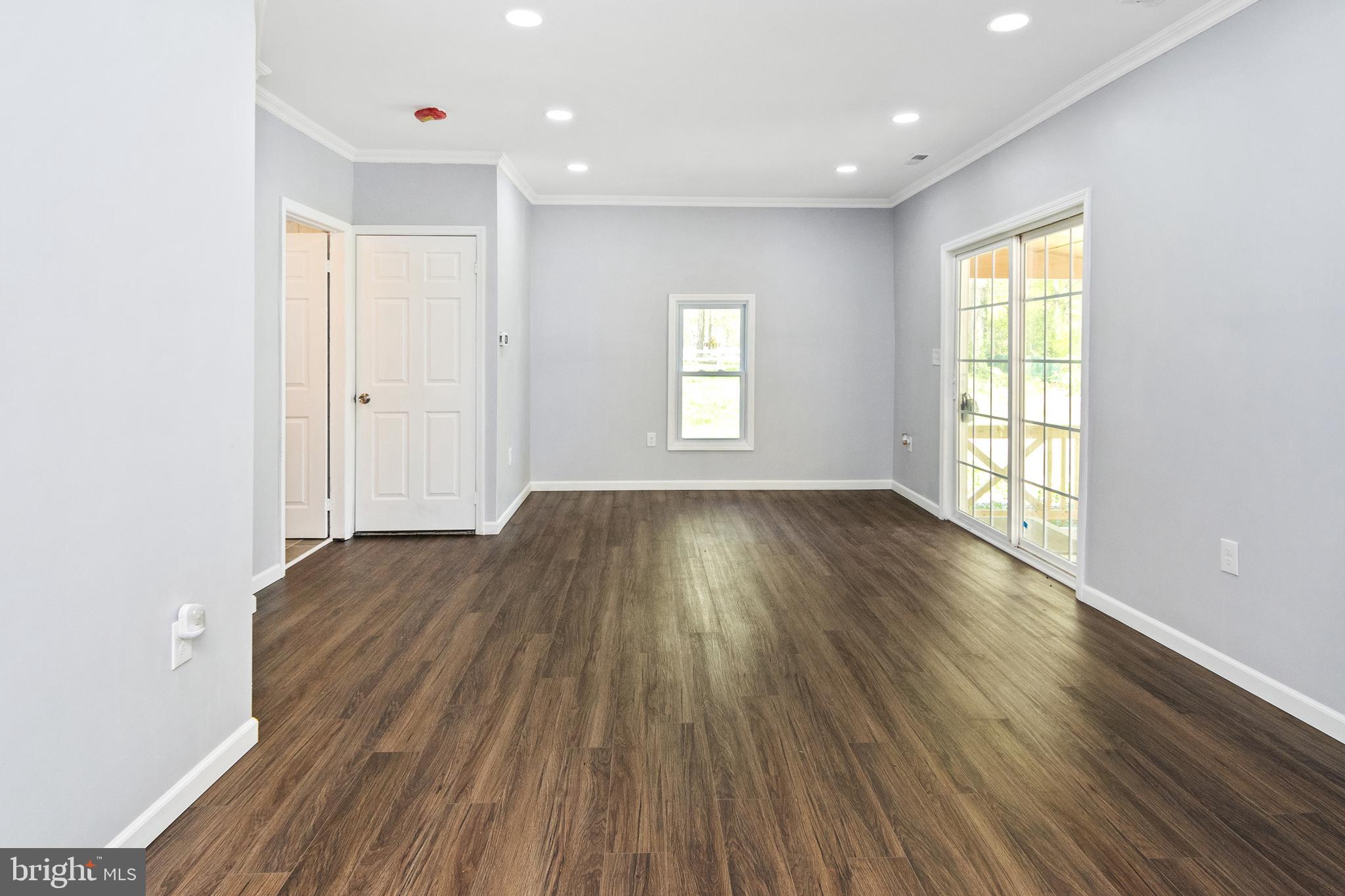 2008 Holly Neck Road Baltimore, MD 21221 - Photo 3 of 23 FAMILY ROOM/DINING ROOM COMBO