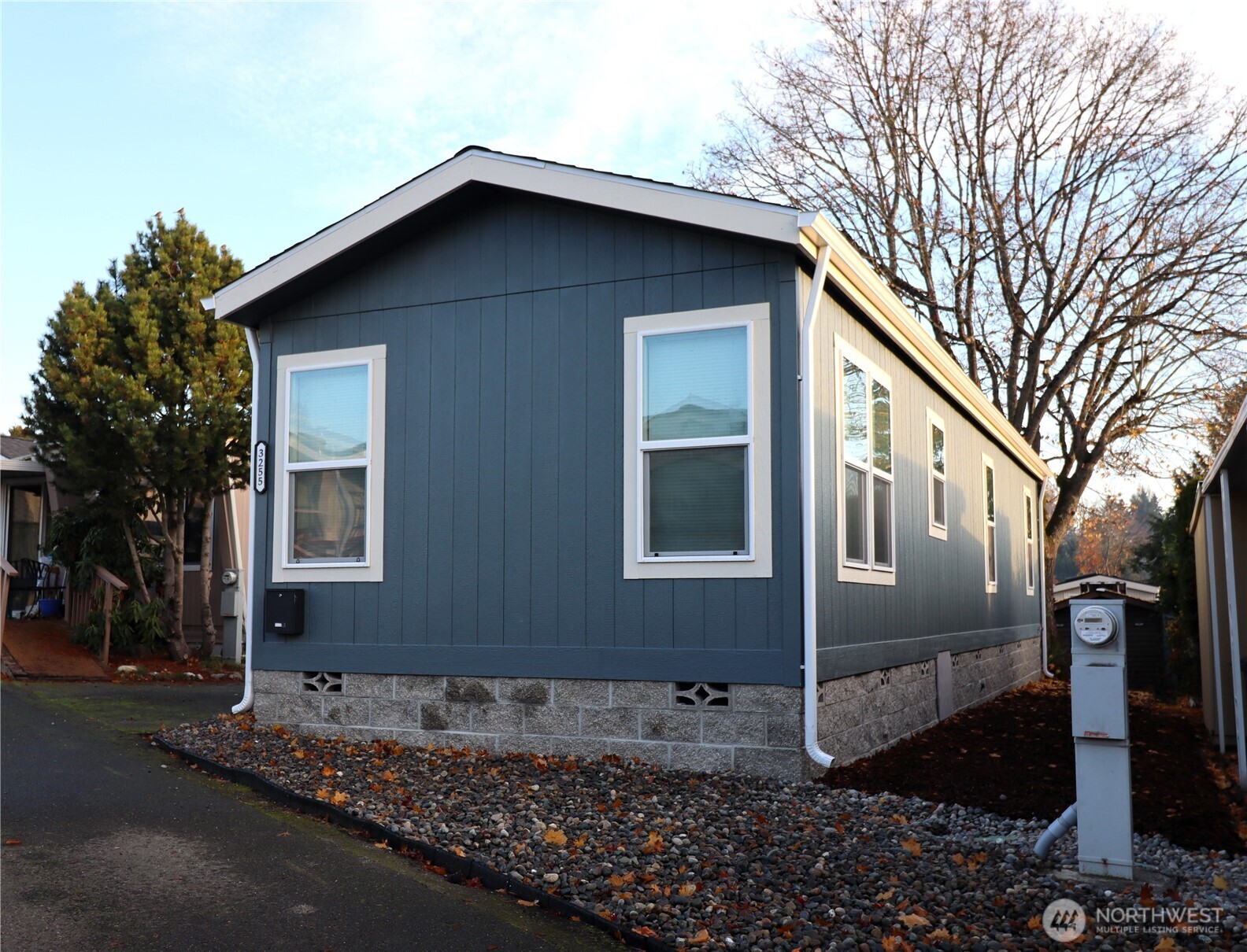 a front view of a house with garage