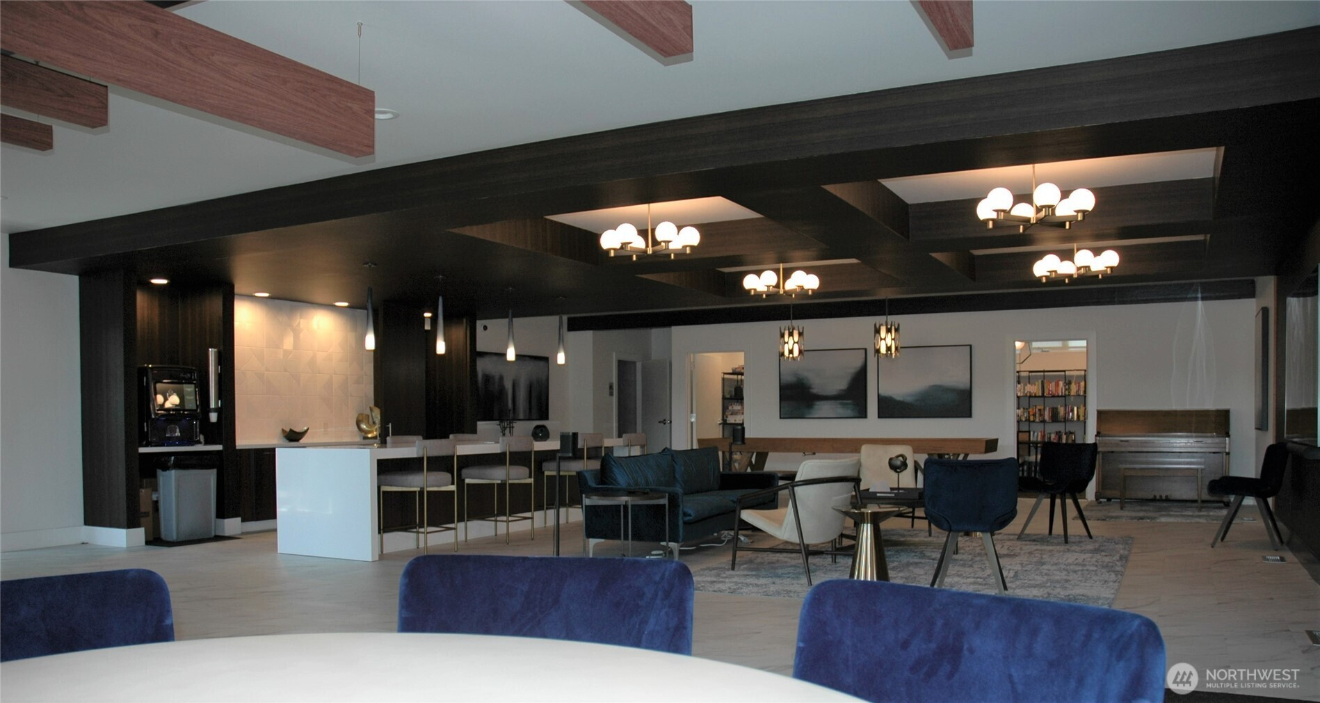 3255 South 181st Street, Unit 97 SeaTac, WA 98188 - Photo 20 of 23 a living room with lots of furniture a chandelier and kitchen view