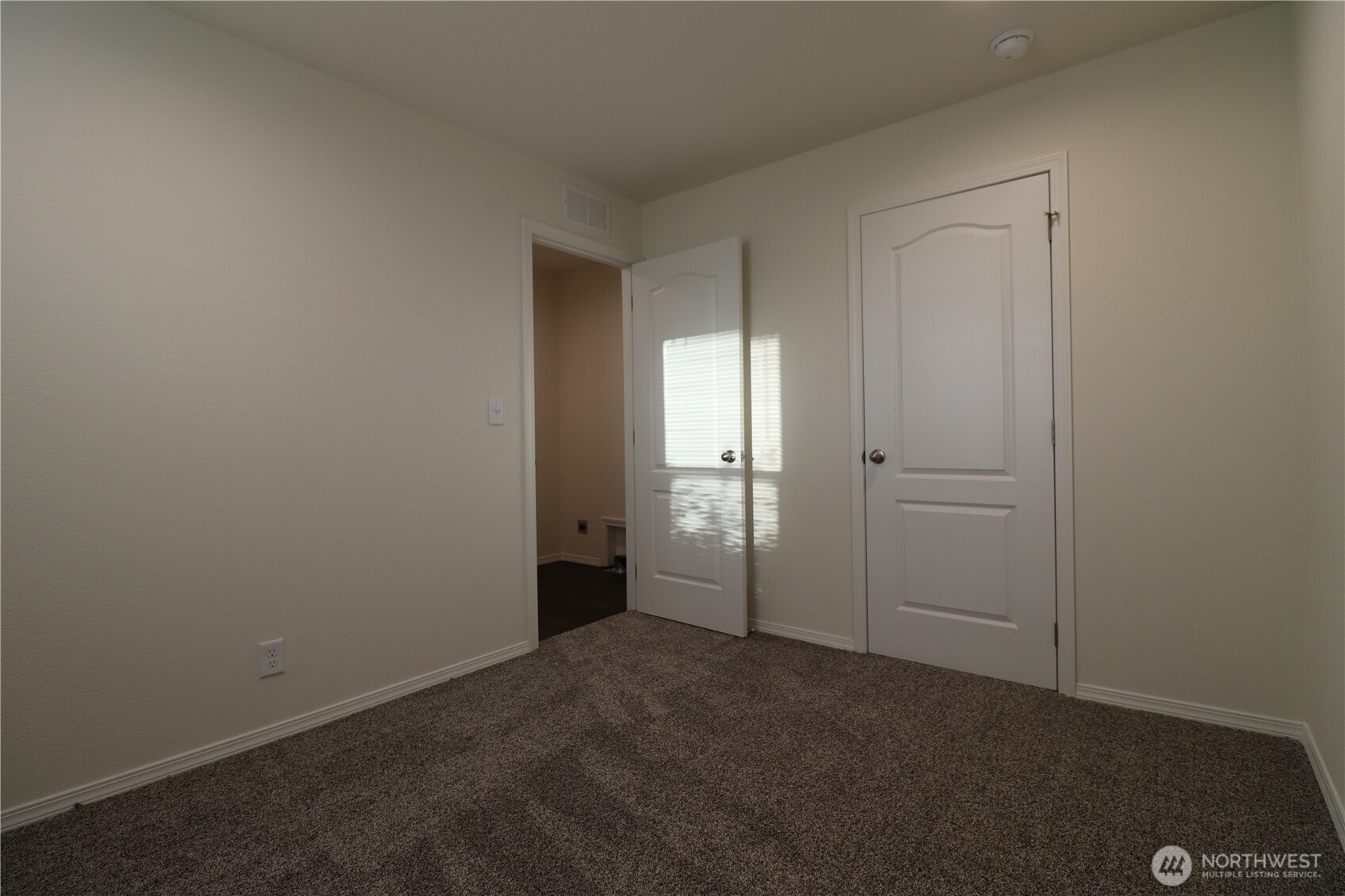 3255 South 181st Street, Unit 97 SeaTac, WA 98188 - Photo 9 of 23 an empty room with closet area