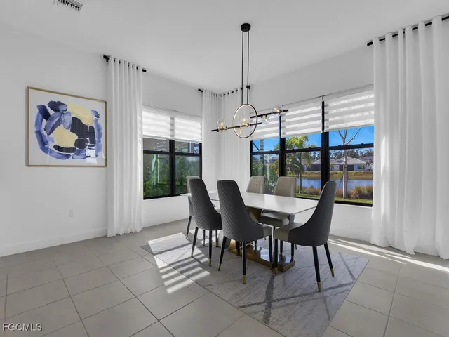a view of a livingroom with furniture and window