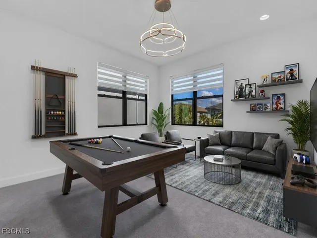 a bathroom with a granite countertop sink and toilet