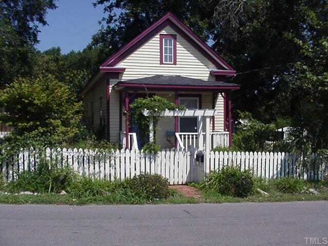 123 Chestnut Street Raleigh, NC 27604 - Photo 1 of 1 a front view of a house with a garden