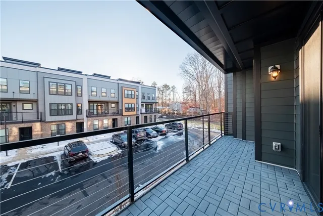 a view of a balcony with city view