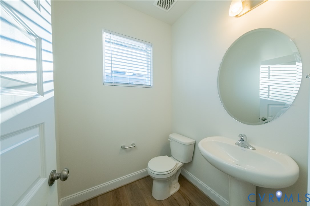 4368 Dominion Forest Circle Glen Allen, VA 23060 - Photo 13 of 36 a bathroom with a sink toilet and a mirror