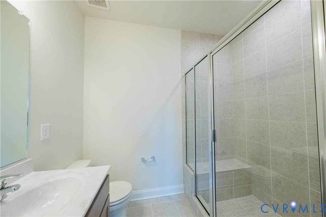 4368 Dominion Forest Circle Glen Allen, VA 23060 - Photo 30 of 36 a bathroom with a sink and toilet