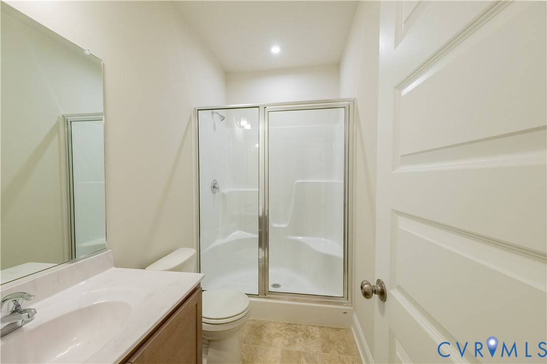 4368 Dominion Forest Circle Glen Allen, VA 23060 - Photo 6 of 36 a bathroom with a sink and a mirror