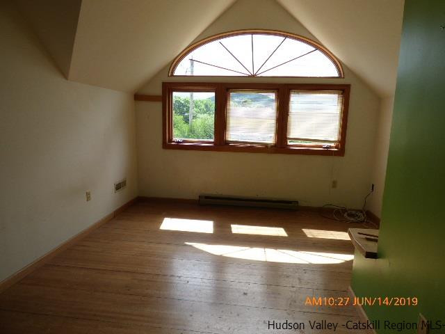 2199 Burroughs Memorial Road Roxbury, NY 12474 - Photo 17 of 34 an empty room with a window